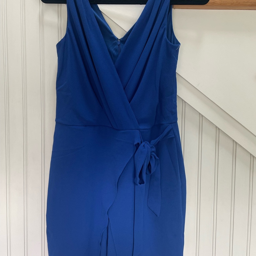 Blue sleeveless short romper. London Style. Never worn.